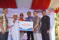 PT Telkom Witel Sumut bantu sarana air bersih di Desa Perlis Langkat. Foto: Ist