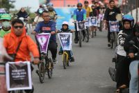 Gowes bersama jurnalis Aceh memperingati Hari Buruh Internasional. Foto: Ist